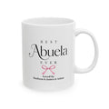 Best Abuela Ever personalized mug - elegant serif and script typography with pink coquette bow and grandkids names on white 11oz ceramic