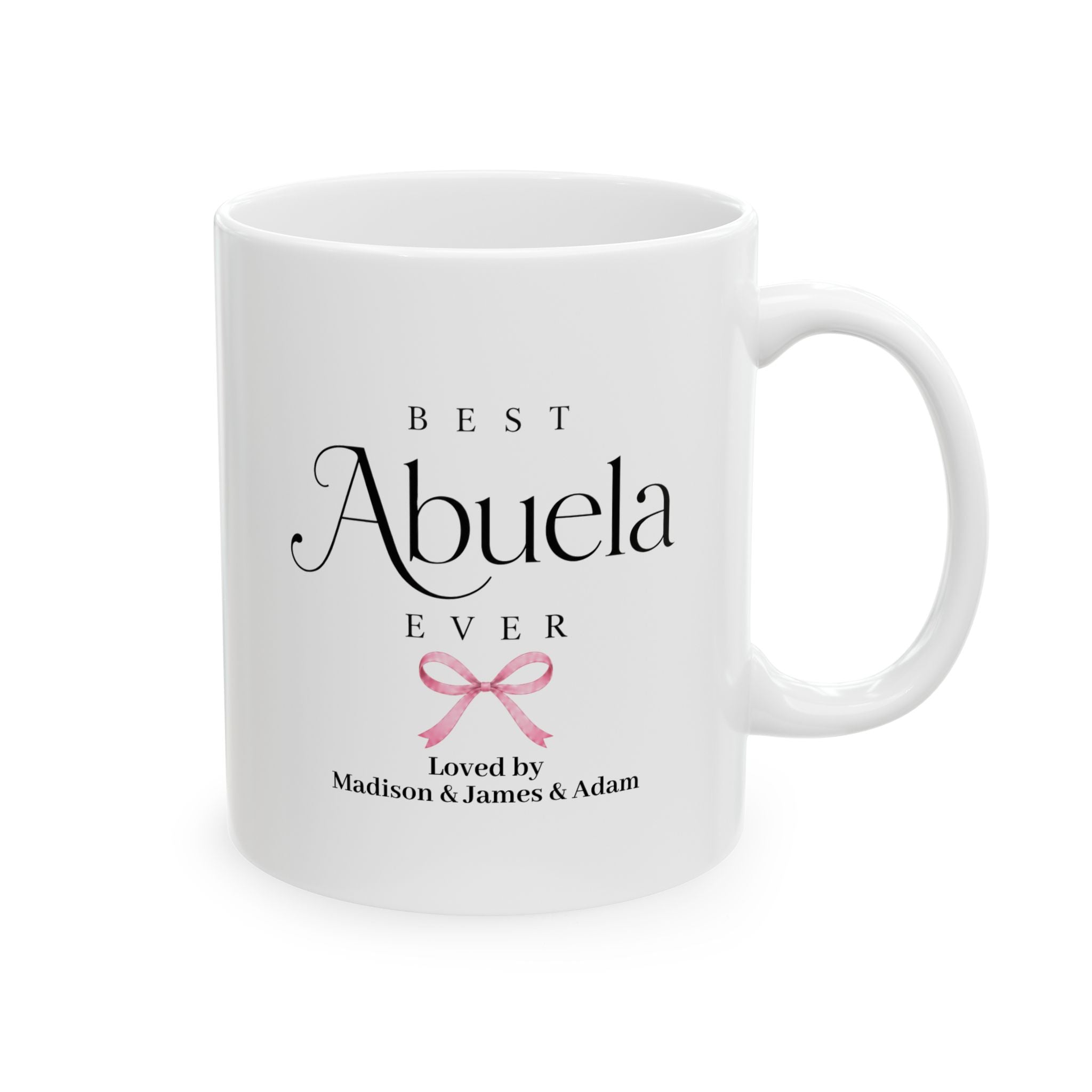 Best Abuela Ever personalized mug - elegant serif and script typography with pink coquette bow and grandkids names on white 11oz ceramic