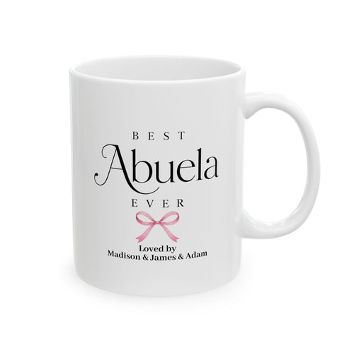 Best Abuela Ever personalized mug - elegant serif and script typography with pink coquette bow and grandkids names on white 11oz ceramic