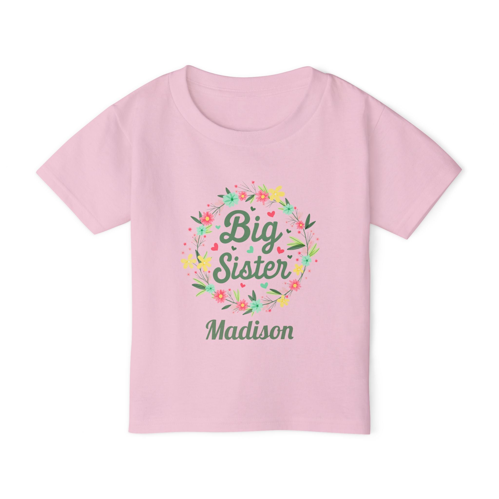 Close-up of Big Sister shirt design - floral wreath with hearts and personalized name in green script font
