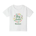 Personalized Big Sister shirt in white - floral wreath design with colorful blooms hearts and custom name in green script on toddler t-shirt
