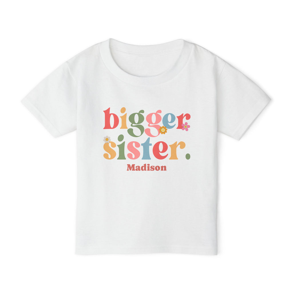 Bigger Sister colorful personalized shirt in white - bold mixed-font design in orange red green blue and pink with flower accents and custom name on toddler t-shirt