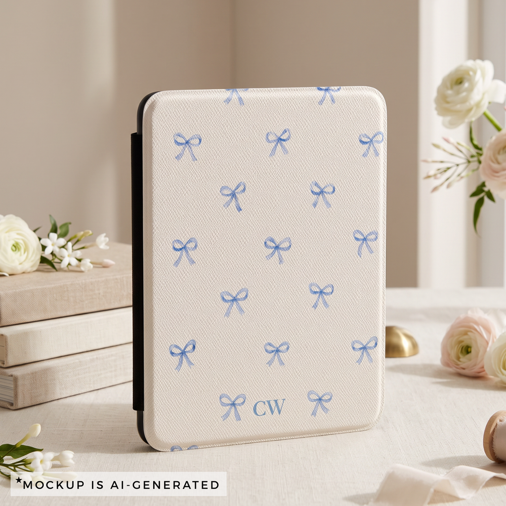 Close-up of coquette blue bow Kindle cover - delicate watercolor ribbon bow pattern on clean cream background