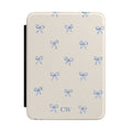 Coquette blue bow personalized Kindle cover - watercolor blue ribbon bows on cream background with custom initials in blue