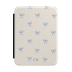 Coquette blue bow personalized Kindle cover - watercolor blue ribbon bows on cream background with custom initials in blue