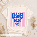Ivory Comfort Colors Dog Mom shirt with bold blue paw print graphic and pink vertical stripes