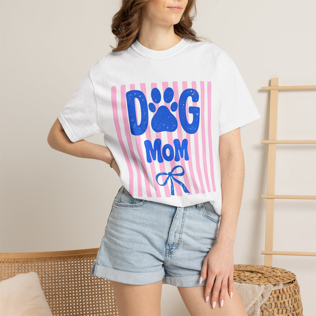 Lifestyle shot of ivory Dog Mom shirt with pink stripe design — worn casually