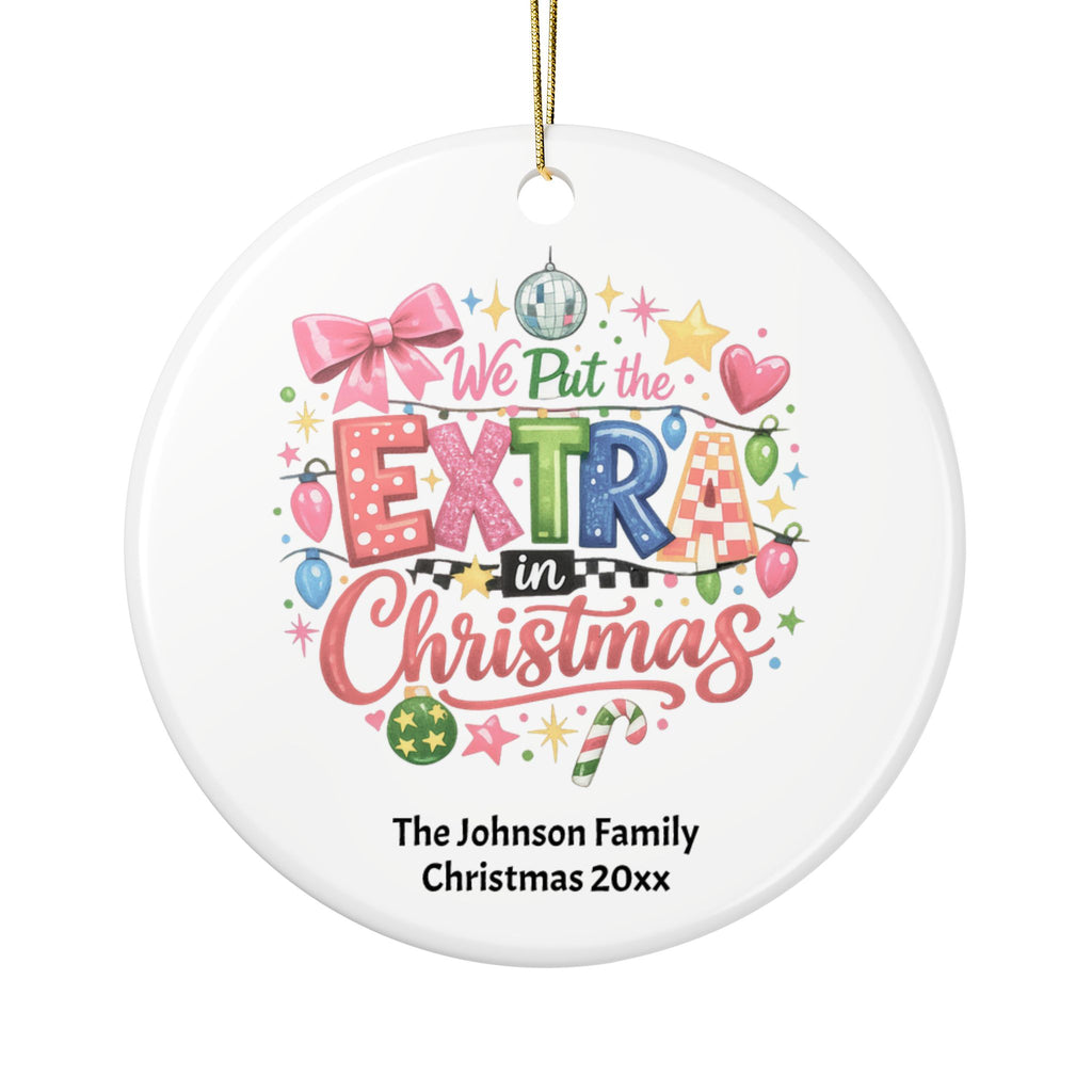Extra in Christmas family ornament displayed with holiday gift wrapping