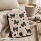 Gothic coquette Kindle cover flat lay - black lace bows burgundy roses bats and spiderwebs on blush pink with personalized initials
