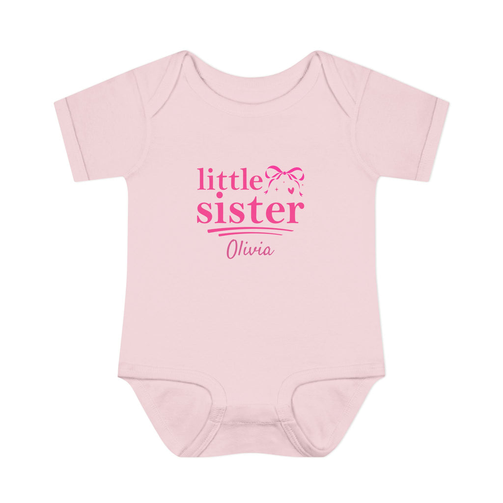 Little Sister personalized baby bodysuit detail - matching coquette bow design with Big Sister shirt for sibling reveal