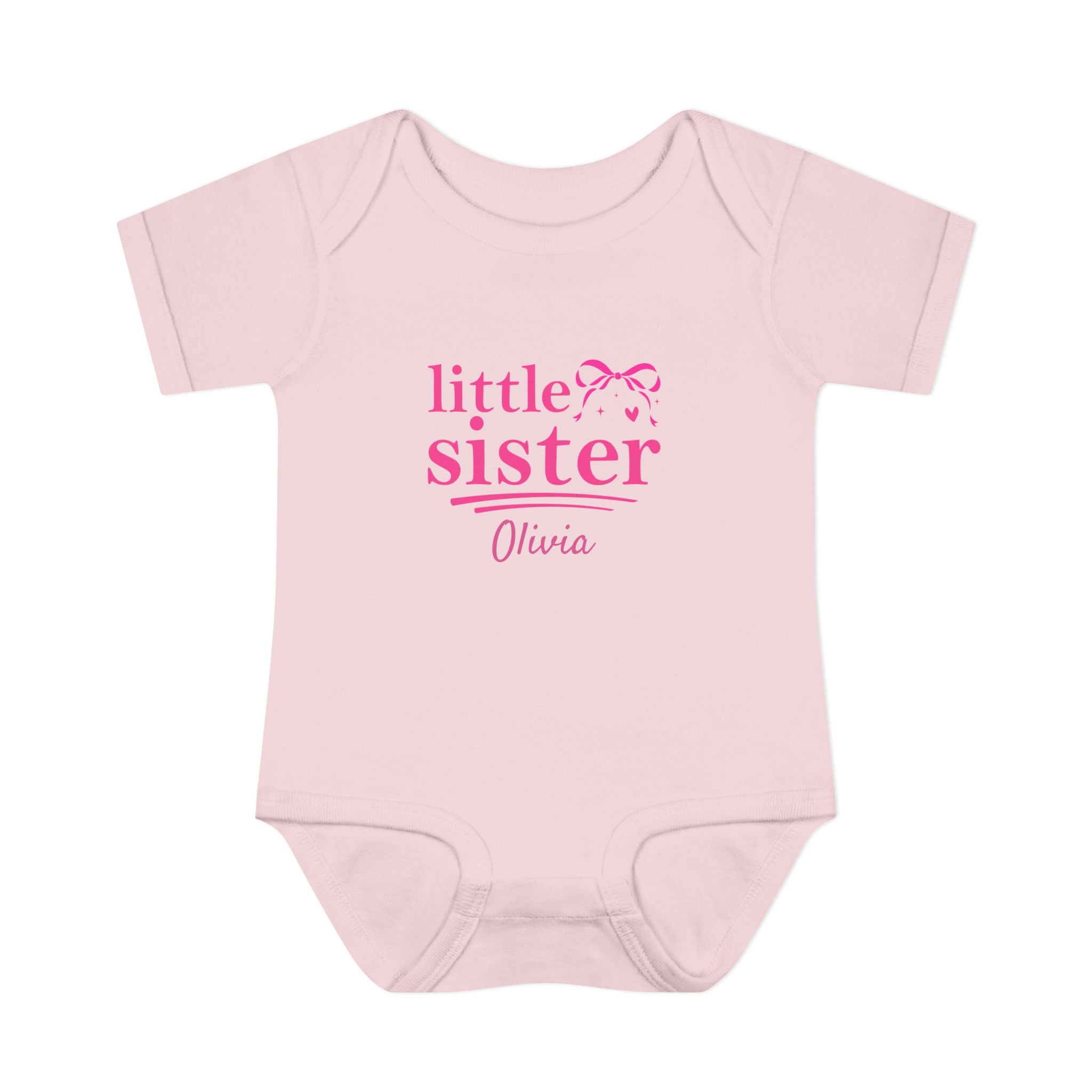 Little Sister personalized baby bodysuit detail - matching coquette bow design with Big Sister shirt for sibling reveal