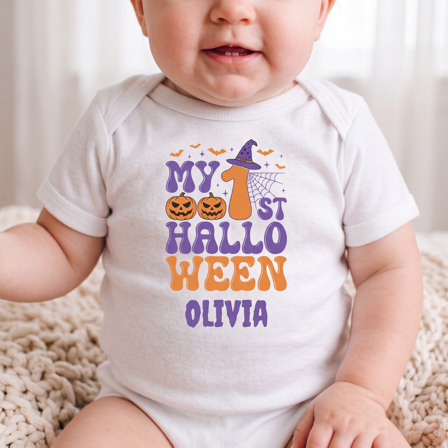 My 1st Halloween baby bodysuit flat lay - purple and orange groovy halloween design with custom baby name