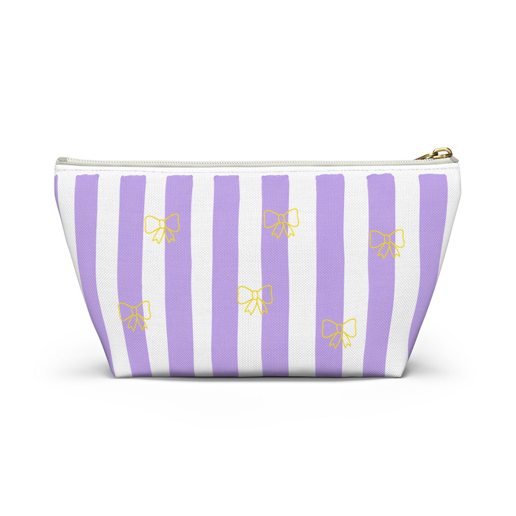Coquette bow cosmetic pouch standing upright, T-bottom structure shown