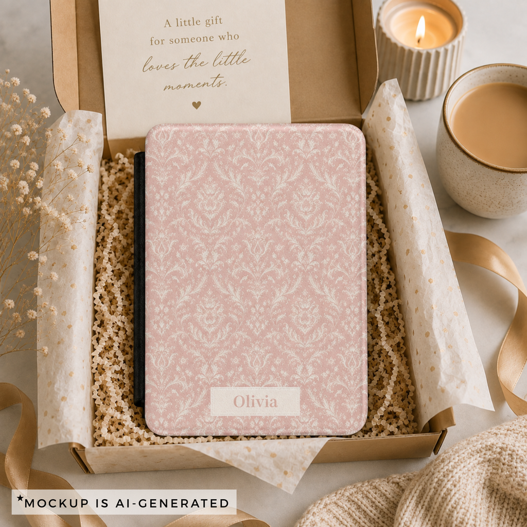 Close-up of the pink damask pattern and personalized name plate on the Kindle case