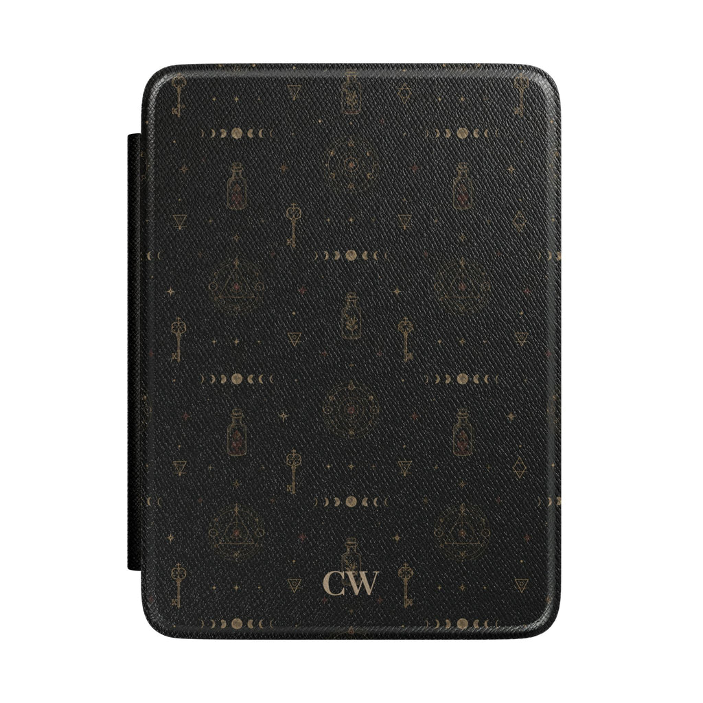 Personalized witchy alchemy Kindle case in black - moon phases skeleton keys potion bottles alchemical triangles stars and custom initials in gold