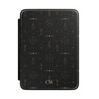 Personalized witchy alchemy Kindle case in black - moon phases skeleton keys potion bottles alchemical triangles stars and custom initials in gold