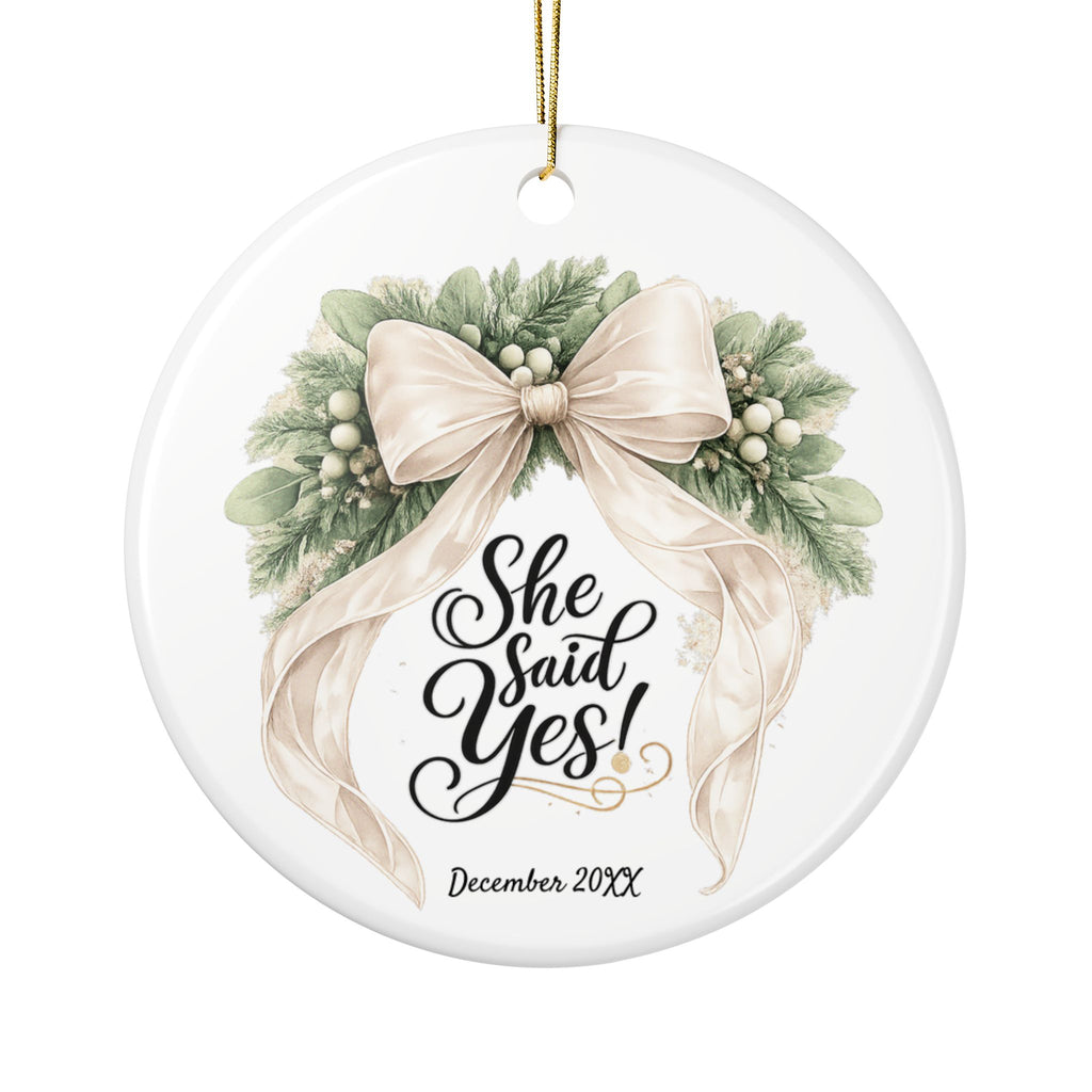 She Said Yes personalized engagement ornament with champagne bow and greenery
