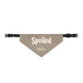Spoiled personalized dog bandana in taupe with cream typography and custom pet name on golden doodle dog