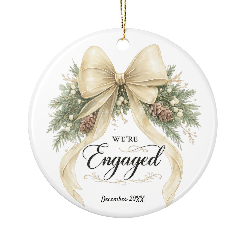 We're Engaged personalized ornament with cream bow, pinecones and greenery